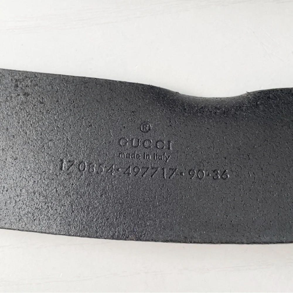 Gucci black leather solid bronze interlocking GG buckle belt